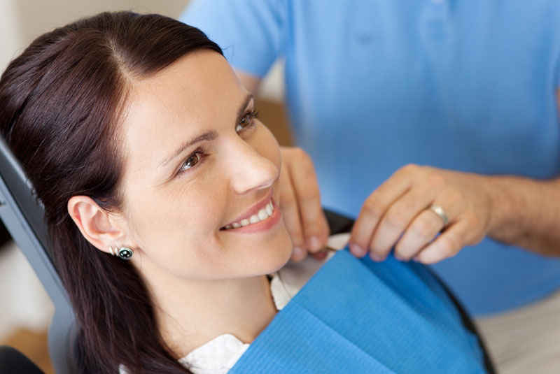 dental patient in chair discussing perio treatment