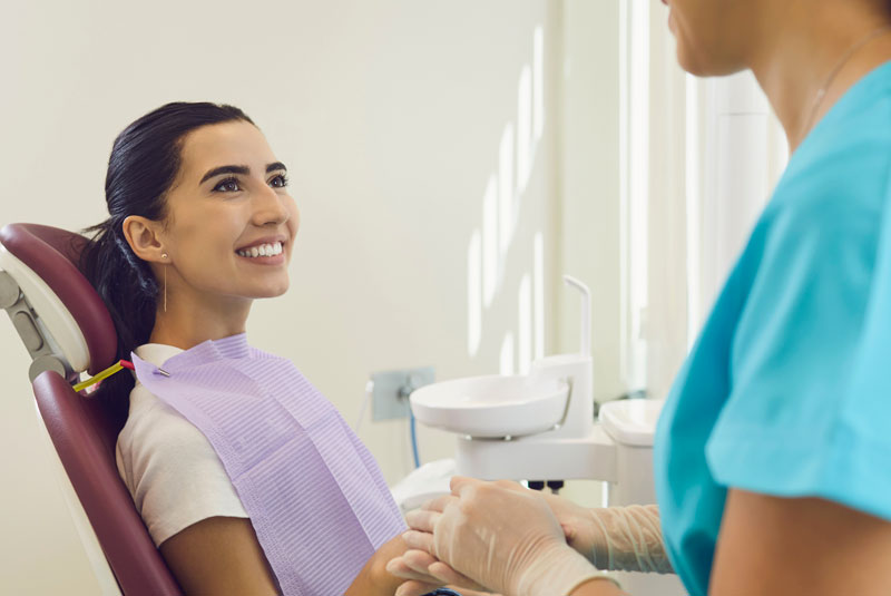 new patient being greeted by rda before dental treatment