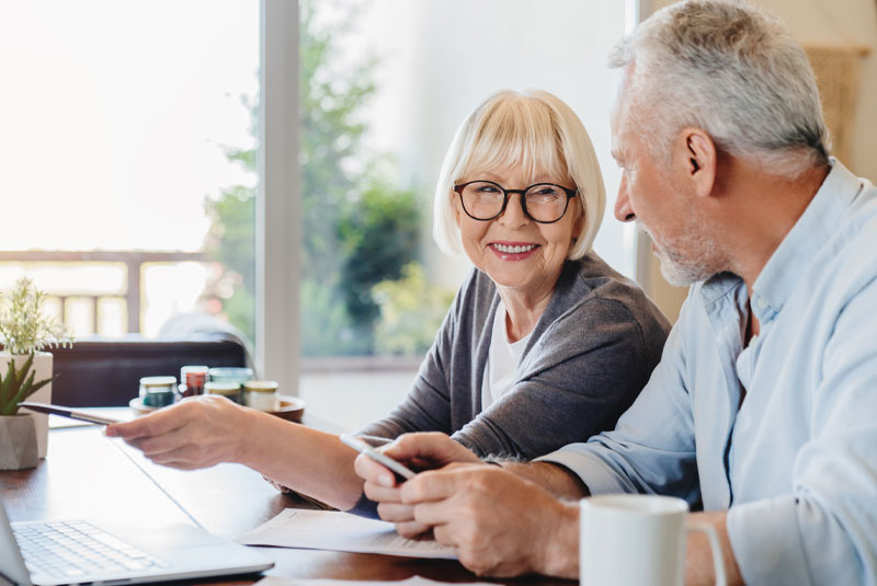 older people gathering forms to bring for dental visit