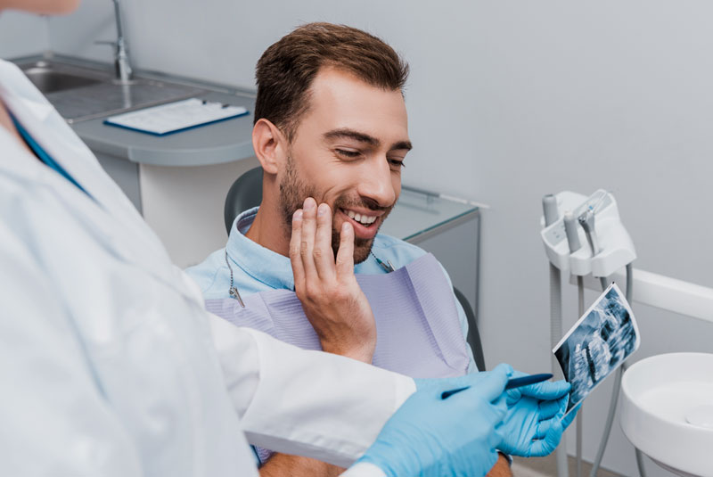 perio patient being shown xray of gums